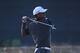 GULLANE, SCOTLAND - JULY 20: Tiger Woods of the United States hits an approach shot during the third round of the 142nd Open Championship at Muirfield on July 20, 2013 in Gullane, Scotland. (Photo by Matthew Lewis/Getty Images)
