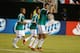 ATLANTA, GA - JULY 20: Raul Jimenez #9 of Mexico celebrates his late second half goal while teammates Luis Montes #8 and Marco Fabian #10 look on during the CONCACAF Gold Cup quarterfinal game against Trinidad & Tobago at the Georgia Dome on July 20, 2013 in Atlanta, Georgia. (Photo by Mike Zarrilli/Getty Images)
