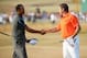 GULLANE, SCOTLAND - JULY 20: Tiger Woods of the United States shakes hands with Lee Westwood of England after finishing the third round of the 142nd Open Championship at Muirfield on July 20, 2013 in Gullane, Scotland. (Photo by Andrew Redington/Getty Images)