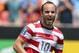 SANDY, UT - JULY 13: Landon Donovan #10 of the United States celebrates his goal against Cuba to tie the game during the first half of an CONCACAF Gold Cup match July 13, 2013 at Rio Tinto Stadium in Sandy, Utah. (Photo by George Frey/Getty Images)