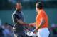 GULLANE, SCOTLAND - JULY 20: Tiger Woods of the United States shakes hands with Lee Westwood of England after finishing the third round of the 142nd Open Championship at Muirfield on July 20, 2013 in Gullane, Scotland. (Photo by Stuart Franklin/Getty Images)