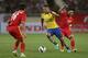 HANOI, VIETNAM - JULY 17: Alex Oxlade -Chamberlain #15 of Arsenal makes a break against Vietnam during the international friendly match between Vietnam and Arsenal FC at My Dinh National Stadium on July 17, 2013 in Hanoi, Vietnam. (Photo by Chris McGrath/Getty Images)