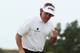 GULLANE, SCOTLAND - JULY 21: Phil Mickelson of the United States reacts after making a birdie putt on the 14th green during the final round of the 142nd Open Championship at Muirfield on July 21, 2013 in Gullane, Scotland. (Photo by Andrew Redington/Getty Images)
