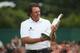 GULLANE, SCOTLAND - JULY 21: Phil Mickelson of the United States holds the Claret Jug after winning the 142nd Open Championship at Muirfield on July 21, 2013 in Gullane, Scotland. (Photo by Andrew Redington/Getty Images)