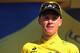 ANNECY, FRANCE - JULY 20: Christopher Froome of Great Britain and Team Sky Procycling celebrates on the podium as he secures the leader's yellow jersey after stage twenty of the 2013 Tour de France, a 125KM road stage from Annecy to Annecy-Semnoz, on July 20, 2013 in Annecy, France. (Photo by Bryn Lennon/Getty Images)
