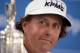 GULLANE, SCOTLAND - JULY 21: Phil Mickelson of the United States holds the Claret Jug as he answers questions after winning the 142nd Open Championship at Muirfield on July 21, 2013 in Gullane, Scotland. (Photo by Stuart Franklin/Getty Images)