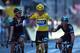 PARIS, FRANCE - JULY 21: Chris Froome of Great Britain and SKY Procycling (C) celebrates as he crosses the finish line flanked by teammates David Lopez (L) and Richie Porte during the twenty first and final stage of the 2013 Tour de France, a processional 133.5KM road stage ending in an evening race around the Champs-Elysees, on July 21, 2013 in Paris, France. (Photo by Bryn Lennon/Getty Images)