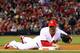 ST LOUIS, MO - OCTOBER 19: Chris Carpenter #29 of the St. Louis Cardinals dives and tags first base for an out in the first inning during Game One of the MLB World Series against the Texas Rangers at Busch Stadium on October 19, 2011 in St Louis, Missouri. (Photo by Dilip Vishwanat/Getty Images)