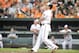 BALTIMORE, MD - JULY 11: Chris Davis #19 of the Baltimore Orioles hits a solo home run in the second inning against the Texas Rangers on July 11, 2013 at Orioles Park at Camden Yards in Baltimore, Maryland. (Photo by Mitchell Layton/Getty Images)