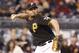 May 13, 2013; Pittsburgh, PA, USA; Pittsburgh Pirates first baseman Gaby Sanchez (14) throws to first base to retire a Milwaukee Brewers hitter during the fifth inning at PNC Park. The Milwaukee Brewers won 5-1. Mandatory Credit: Charles LeClaire-USA TODAY Sports