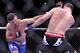 Jan 28, 2012; Chicago, IL, USA; UFC fighter Demian Maia (left) fights against Chris Weidman during UFC on Fox 2 at the United Center. Weidman defeats Maia. Mandatory Credit: Mike Dinovo-USA TODAY Sports