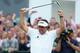 GULLANE, SCOTLAND - JULY 21: Phil Mickelson of the United States reacts to a birdie putt on the 18th hole during the final round of the 142nd Open Championship at Muirfield on July 21, 2013 in Gullane, Scotland. (Photo by Andy Lyons/Getty Images)
