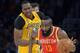 Apr 17, 2013; Los Angeles, CA, USA; Houston Rockets guard James Harden (13) dribbles the ball with Los Angeles Lakers center Dwight Howard (12) in pursuit at the Staples Center. Mandatory Credit: Kirby Lee-USA TODAY Sports