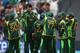 BIRMINGHAM, ENGLAND - JUNE 10: Muhammad Irfan (3L) of Pakistan receives team mates congratulations after taking the wicket of Faf Du Plessis of South Africa during the ICC Champions Trophy Group B match between Pakistan and South Africa at Edgbaston on June 10, 2013 in Birmingham, England. (Photo by Michael Steele/Getty Images)
