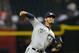 PHOENIX, AZ - JULY 11: Yovani Gallardo #49 of the Milwaukee Brewers delivers a pitch against the Arizona Diamondbacks at Chase Field on July 11, 2013 in Phoenix, Arizona. (Photo by Norm Hall/Getty Images)