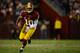 LANDOVER, MD - JANUARY 06: Robert Griffin III #10 of the Washington Redskins runs the ball against the Seattle Seahawks during the NFC Wild Card Playoff Game at FedExField on January 6, 2013 in Landover, Maryland. (Photo by Patrick McDermott/Getty Images)