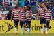 BALTIMORE, MD - JULY 21: Kyle Beckerman #14 celebrates with Landon Donovan #10 of the United States after Mix Diskerud #8 scored a goal in the second half against El Salvador during the 2013 CONCACAF Gold Cup quarterfinal game at M&T Bank Stadium on July 21, 2013 in Baltimore, Maryland. (Photo by Patrick McDermott/Getty Images)