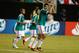 ATLANTA, GA - JULY 20: Raul Jimenez #9 of Mexico celebrates his late second half goal while teammates Luis Montes #8 and Marco Fabian #10 look on during the CONCACAF Gold Cup quarterfinal game against Trinidad & Tobago at the Georgia Dome on July 20, 2013 in Atlanta, Georgia. (Photo by Mike Zarrilli/Getty Images)