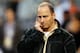 DETROIT, MI - OCTOBER 17: New York Yankees general manager Brian Cashman talks on the phone on the field during batting practice against the Detroit Tigers during game four of the American League Championship Series at Comerica Park on October 17, 2012 in Detroit, Michigan. (Photo by Gregory Shamus/Getty Images)