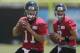 July 27, 2012; Jacksonville FL, USA; Jacksonville Jaguars quarterback Blaine Gabbert (11) and quarterback Chad Henne (7) during the first afternoon of training camp practice at Florida Blue Health & Wellness Practice Fields. Mandatory Credit: Phil Sears-USA TODAY Sports