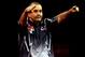 LONDON, ENGLAND - JANUARY 1: Phil Taylor celebrates winning the tenth set against Michael van Gerwen of the Netherlands during the final of the 2013 Ladbrokes.com World Darts Championship at the Alexandra Palace on January 1, 2013 in London, England. (Photo by Ben Hoskins/Getty Images)