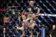 Jan 26, 2013; Chicago, IL, USA; Demetrious Johnson celebrates after defeating John Dodson (not pictured) during UFC on FOX 6 for the world flyweight championship at the United Center. Mandatory Credit: David Banks-USA TODAY Sports