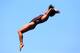 BARCELONA, SPAIN - JULY 24: Ruolin Chen of China competes in the Women's 10m Platform Diving semi final on day five of the 15th FINA World Championships at Piscina Municipal de Montjuic on July 24, 2013 in Barcelona, Spain. (Photo by Alexander Hassenstein/Getty Images)