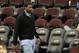 Mar 8, 2013; Cleveland, OH, USA; NBA free agent Greg Oden walks along the court after the game between the Memphis Grizzlies and Cleveland Cavaliers 103-92 at Quicken Loans Arena. Mandatory Credit: David Richard-USA TODAY Sports