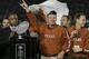 PASADENA, CA - JANUARY 04: Head coach Mack Brown of the Texas Longhorns celebrates with the National Championship trophy after defeating the USC Trojans 41-38 to win the BCS National Championship Rose Bowl Game on January 4, 2006 in Pasadena, California. (Photo by Stephen Dunn/Getty Images)