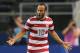 Jul 24, 2013; Arlington, TX, USA; USA forward Landon Donovan (10) yells as he celebrates a goal in the first half against Honduras at Cowboys Stadium. Mandatory Credit: Matthew Emmons-USA TODAY Sports