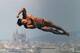 BARCELONA, SPAIN - JULY 20: Li Shixin of China competes in the Men's 1m Springboard Diving preliminary round on day one of the 15th FINA World Championships at Piscina Municipal de Montjuic on July 20, 2013 in Barcelona, Spain. (Photo by Clive Rose/Getty Images)