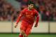 MELBOURNE, AUSTRALIA - JULY 24: Luis Suarez of Liverpool runs with the ball during the match between the Melbourne Victory and Liverpool at the Melbourne Cricket Ground on July 24, 2013 in Melbourne, Australia. (Photo by Scott Barbour/Getty Images)