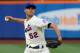 Jul 23, 2013; New York, NY, USA; New York Mets starting pitcher Carlos Torres (52) pitches during the first inning against the Atlanta Braves at Citi Field. Mandatory Credit: Anthony Gruppuso-USA TODAY Sports