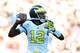 TAMPA, FL - JANUARY 1: Quarterback Devin Gardner #12 of the Michigan Wolverines passes in the fourth quarter against the South Carolina Gamecocks in the Outback Bowl January 1, 2013 at Raymond James Stadium in Tampa, Florida. South Carolina won 33 - 28. (Photo by Al Messerschmidt/Getty Images)
