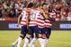 SAN DIEGO, CA - JULY 05: (L-R) Mix Diskerud #8, Landon Donovan #10, Herculez Gomez #9 and DaMarcus Beasley #7 of the USA celebrate Donovan's goal against Guatemala in the second half at Qualcomm Stadium on July 5, 2013 in San Diego, California. The USA defeated Guatemala 6-0. (Photo by Jeff Gross/Getty Images)