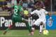 NELSPRUIT, SOUTH AFRICA - FEBRUARY 06: Christian Atsu Twasam from Ghana and Saidou Mady Panandetiguiri from Burkina Faso compete for the ball during the 2013 Orange African Cup of Nations 2nd Semi Final match between Burkina Faso and Ghana at Mbombela Stadium on February 06, 2013 in Nelspruit, South Africa. (Photo by Manus van Dyk/Gallo Images/Getty Images)
