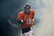 Jan 12 2013; Denver, CO, USA; Denver Broncos quarterback Peyton Manning (18) before the start of the game against the Baltimore Ravens of the AFC divisional round playoff game at Sports Authority Field. Mandatory Credit: Ron Chenoy-USA TODAY Sports