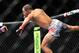 Feb 2, 2013; Las Vegas, NV, USA; Frankie Edgar (left) and Jose Aldo (right) battle each other during UFC 156 at the Mandalay Bay Events Center. Mandatory Credit: Gary A. Vasquez-USA TODAY Sports