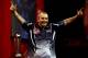 LONDON, ENGLAND - JANUARY 1: Phil Taylor of England celebrates winning the final of the 2013 Ladbrokes.com World Darts Championship after defeating Michael van Gerwen of the Netherlands at the Alexandra Palace on January 1, 2013 in London, England. (Photo by Ben Hoskins/Getty Images)