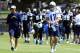 Jul 25, 2013; San Diego, CA, USA; San Diego Chargers head coach Mike McCoy and quarterback Philip Rivers (17) walk on the field before drills at training camp at Chargers Park. Mandatory Credit: Christopher Hanewinckel-USA TODAY Sports