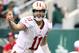 Sept. 30, 2012; East Rutherford, NJ, USA; San Francisco 49ers quarterback Alex Smith (11) gestures as he calls out a play against the New York Jets during the second half at MetLife Stadium. 49ers won 34-0. Mandatory Credit: Debby Wong-USA TODAY Sports