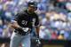 KANSAS CITY, MO - JUNE 22: Alex Rios #51 of the Chicago White Sox flies out to center against the Kansas City Royals in the fifth inning on June 22, 2013 at Kauffman Stadium in Kansas City, Missouri. (Photo by Kyle Rivas/Getty Images)