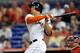 MIAMI, FL - JULY 13: Giancarlo Stanton #27 of the Miami Marlins connects for a solo home run in the ninth inning against the Washington Nationals at Marlins Park on July 13, 2013 in Miami, Florida. (Photo by Steve Mitchell/Getty Images)