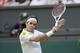 Jun 26, 2013; London, United Kingdom; Roger Federer (SUI) in his match against Sergiy Stakhovsky (UKR) on day three of the 2013 Wimbledon Championships at the All England Lawn Tennis Club. Mandatory Credit: Susan Mullane-USA TODAY Sports