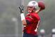 FOXBORO, MA - JULY 26: Tom Brady #12 throws during the first day of New England Patriots Training Camp at Gillette Stadium on July 26, 2013 in Foxboro, Massachusetts. (Photo by Jim Rogash/Getty Images)