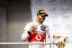 BUDAPEST, HUNGARY - JULY 29: Lewis Hamilton of Great Britain and McLaren celebrates on the podium after winning the Hungarian Formula One Grand Prix at the Hungaroring on July 29, 2012 in Budapest, Hungary. (Photo by Drew Gibson/Getty Images)