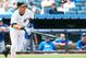 NEW YORK, NY - MAY 30: Derek Jeter #2 of the New York Yankees warms up as LaTroy Hawkins #32 of the New York Mets looks on prior to the game on May 30, 2013 at Yankee Stadium in the Bronx borough of New York City (Photo by Al Bello/Getty Images)
