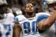 NEW ORLEANS, LA - JANUARY 07: Ndamukong Suh #90 of the Detroit Lions looks on during warm ups prior to playing against the New Orleans Saints in the 2012 NFC Wild Card Playoff at Mercedes-Benz Superdome game on January 7, 2012 in New Orleans, Louisiana. (Photo by Ronald Martinez/Getty Images)