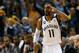 MEMPHIS, TN - MAY 25: Mike Conley #11 of the Memphis Grizzlies reacts after making a three-pointer in the first half while taking on the San Antonio Spurs during Game Three of the Western Conference Finals of the 2013 NBA Playoffs at the FedExForum on May 25, 2013 in Memphis, Tennessee. NOTE TO USER: User expressly acknowledges and agrees that, by downloading and or using this photograph, User is consenting to the terms and conditions of the Getty Images License Agreement. (Photo by Kevin C. Cox/Getty Images)
