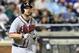 Jul 24, 2013; New York, NY, USA; Atlanta Braves catcher Brian McCann (16) goes to first after being hit by a pitch during the eighth inning against the New York Mets at Citi Field. Mandatory Credit: Anthony Gruppuso-USA TODAY Sports